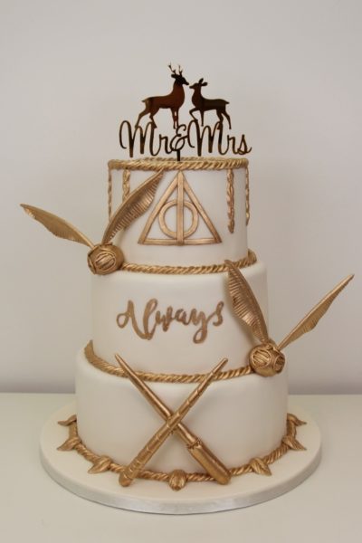 Novelty Style Wedding Cakes and Wedding Cakes with Cake Toppers